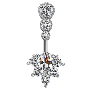 Macro shot of silver body piercing jewelry featuring zircon wing heart and teardrop design