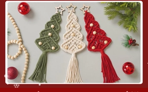Detail of handmade woven cotton Christmas tree ornaments with wooden stars and beads