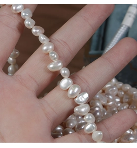 Macro shot of 6-7mm irregular baroque freshwater pearls for handmade jewelry DIY