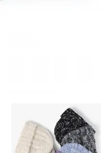 Close-up of thick ribbed knit beanies showing the fluffy mohair texture and warm fabric