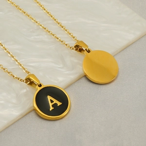 Classic gold stainless steel necklace featuring a black enamel letter A round pendant