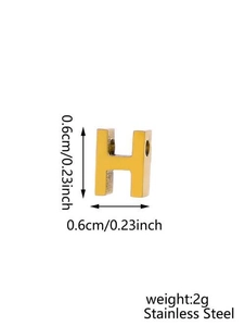 Close-up of 18k gold-plated stainless steel H-letter pendant with 0.6cm dimensions
