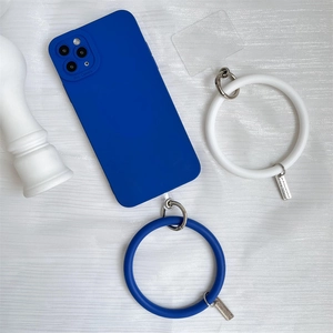 Close-up of silicone phone wrist strap ring with protective camera lens case