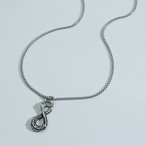 Men's retro silver necklace with snake-textured infinity symbol pendant on gray background