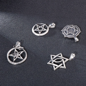 Detail showing four silver stainless steel Masonic pentagram and hexagram pendants