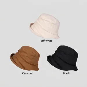 Women UV protection bucket hats with raw edge design in beige, caramel and black colors