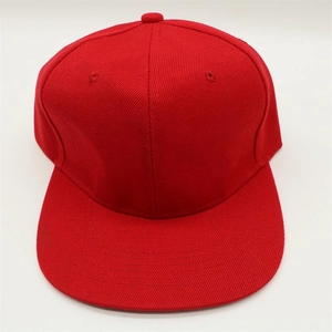 Top view of a red cotton flat-brimmed hip-hop cap with six-panel crown and classic stitching