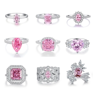 Kollektion aus neun S925 Sterlingsilber Ringen mit rosa Karbondiamanten im Eisschliff