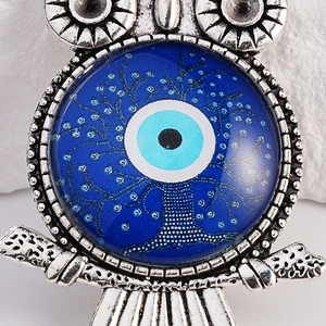 Silver owl keychain pendant with blue evil eye and tree of life design in vintage style