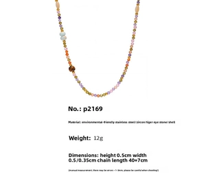 Detailed view of handmade beaded necklace with tiger eye stone and shell measurements