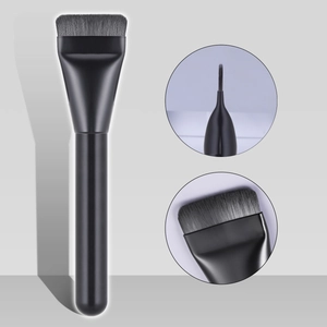 Flat head foundation brush in black with dense bristles and close-up detail views