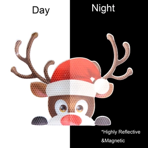 Day and night comparison of reflective magnetic reindeer decal with Santa hat on car surface