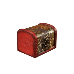 Vintage red wooden jewelry storage box with gold floral patterns and bronze clasp