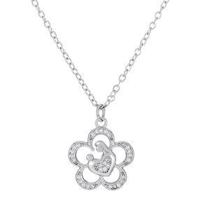 Detailed view of silver flower pendant with mother and child silhouette and zircons
