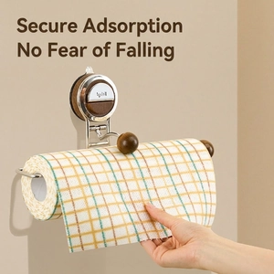 Wall-mounted kitchen paper holder with suction cup and walnut wood accents on steel