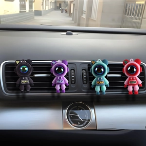 Set of four cute astronaut car air vent clips in black purple cyan and red colors