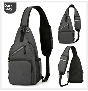 Dark grey waterproof chest bag detail with earphone port and breathable shoulder strap