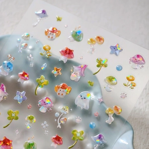 Adesivi per unghie 3D colorati con funghi e stelle iridescenti su vassoio ondulato