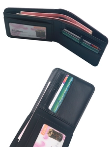 Interior detail of vintage skull wallet showing card slots, bill pocket and photo window