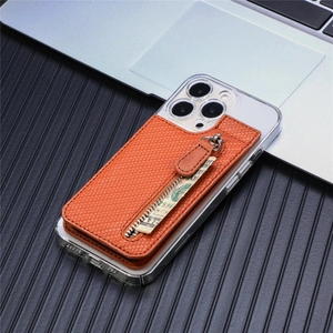 Detailed view of an orange woven leather zipper wallet attached to a clear phone case
