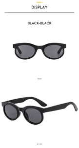 Close-up of vintage oval black sunglasses showing front and 45-degree side view