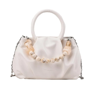 Elegant cream cloud bag with beaded handle and silver chain strap on white background