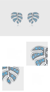 Makro-Detail von blattförmigen S925 Sterlingsilber-Ohrringen mit Türkis-Pavé-Fassung