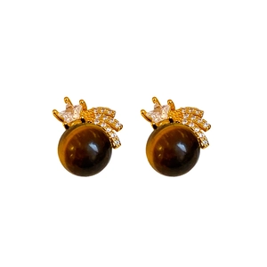 Tiger eye and zircon star pearl earrings in gold-tone metal with a vintage luxury design