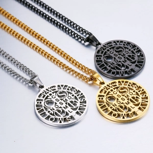Detailed view of hollowed cross pendants in silver, gold, and black stainless steel