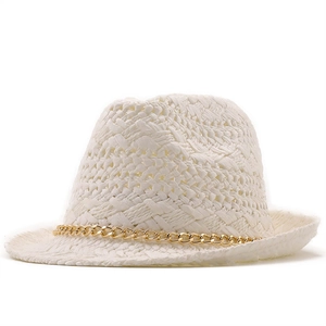 White hand-woven straw jazz hat with golden chain decoration for summer beach travel