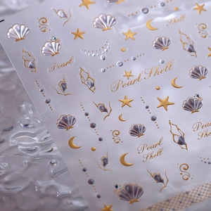 Golden and laser silver ocean theme nail art stickers with shells, stars and moon patterns