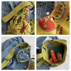 Detail view of large floral canvas tote bag showing interior space and retro printed pattern