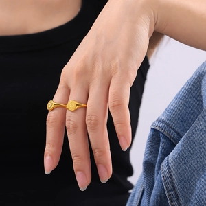 Elegant 18k gold plated sunflower ring with dual circular textures on hand