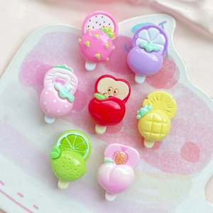 Detailed view of colorful fruit-shaped resin popsicle accessories for DIY jewelry crafts