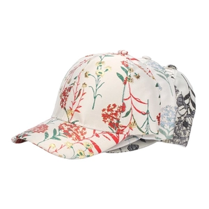 Detailed close-up of ethnic floral patterns on three cotton baseball caps for women