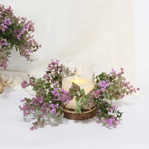Violet eucalyptus leaf candle ring with glass holder and natural wood base centerpiece