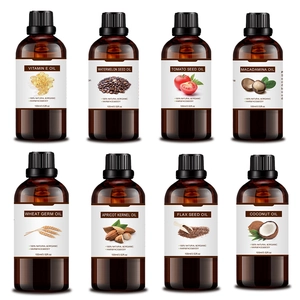 Macro view of eight 100ml amber glass bottles with natural organic plant-based essential oils