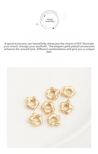 Close-up of 14K gold-filled flower spacers for DIY jewelry making and handmade crafts
