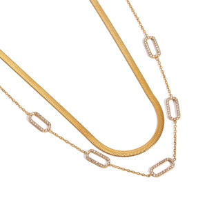 Luxurious gold stainless steel rhinestone necklace set featuring snake chain and crystal links