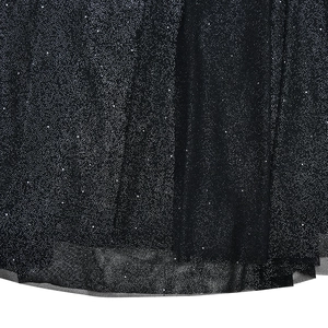Macro shot of elegant black mesh fabric featuring shimmering silver glitters for evening dresses