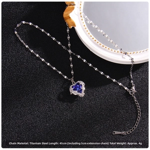Detail of sapphire blue heart pendant on a titanium steel chain with 45cm length