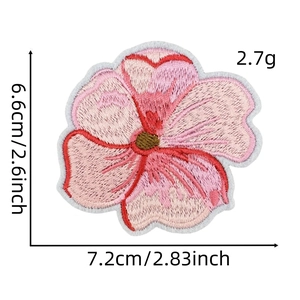 Detail view of pink flower embroidered patch showing precise measurements and fine textures