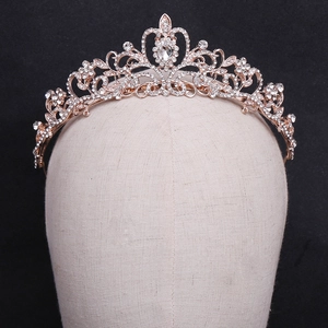 Luxurious rose gold crystal bridal tiara with vine patterns for wedding hair styling