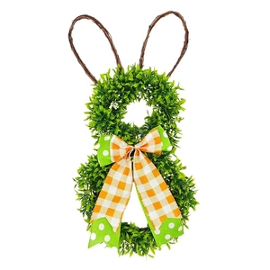 Easter bunny wreath with green foliage, vine ears, and a plaid burlap bow decoration