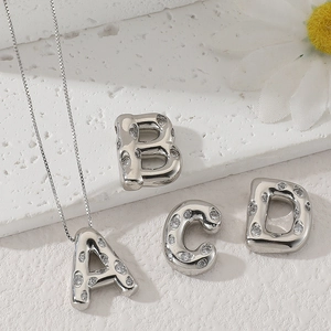 Silver letter necklace A-D with micro-paved zircons and minimalist alphabet pendant