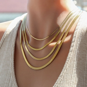 Men's hip-hop style layered gold flat snake bone chain necklace set for street fashion