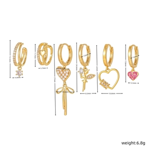 Detailed size chart of six gold bow and pearl earrings set with 6.8g total weight