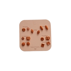 Set di 7 paia di orecchini in argento a tema pasticceria con cornetti e pretzel