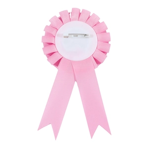Detailed view of pink baby shower satin ribbon badge with rosette floral design