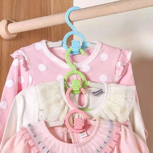 S-shaped bear cascading clothes hanger hooks in pink green and blue for space saving